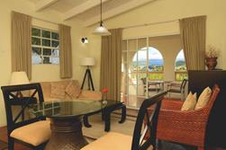 Blue Horizons Garden Resort - Grenada. One bed deluxe, seating area. 